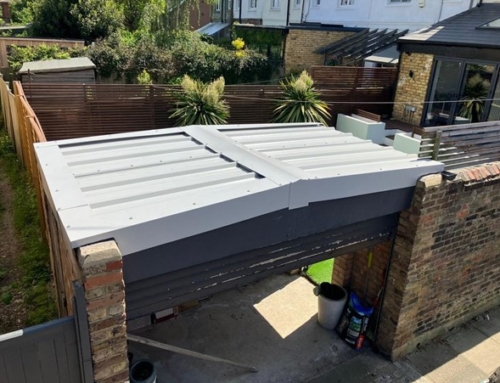 Asbestos concrete roof removal and replacement in Tooting