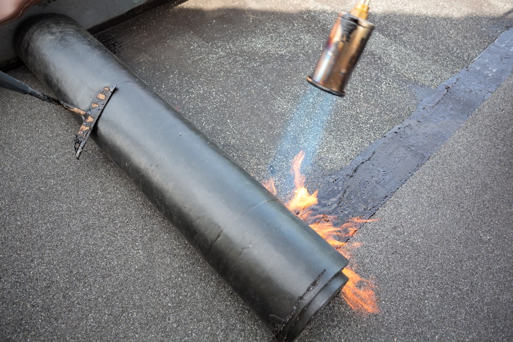 Removal of felt garage roof in Sutton