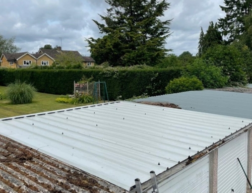 Asbestos cement garage roof removal and replacement in Staines